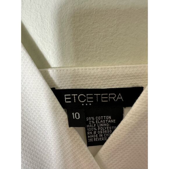Etcetera White Textured Cotton Wrap Top Sz 10. Size says 10. It is a 6 - Picture 2 of 4